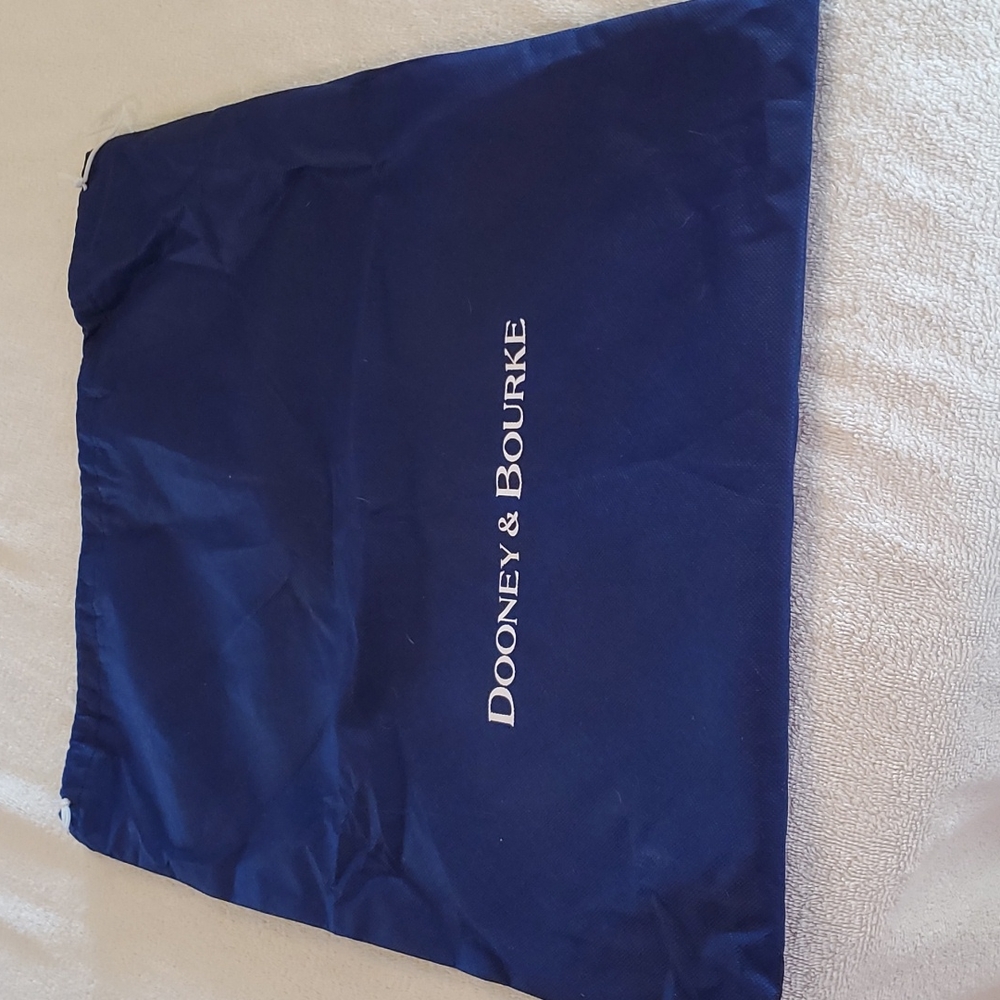 DOONEY AND BOURKE DUSTBAG.